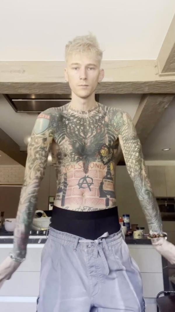 MGK shares video of getting viral blackout tattoo: 'Most painful s--t I ever experienced'