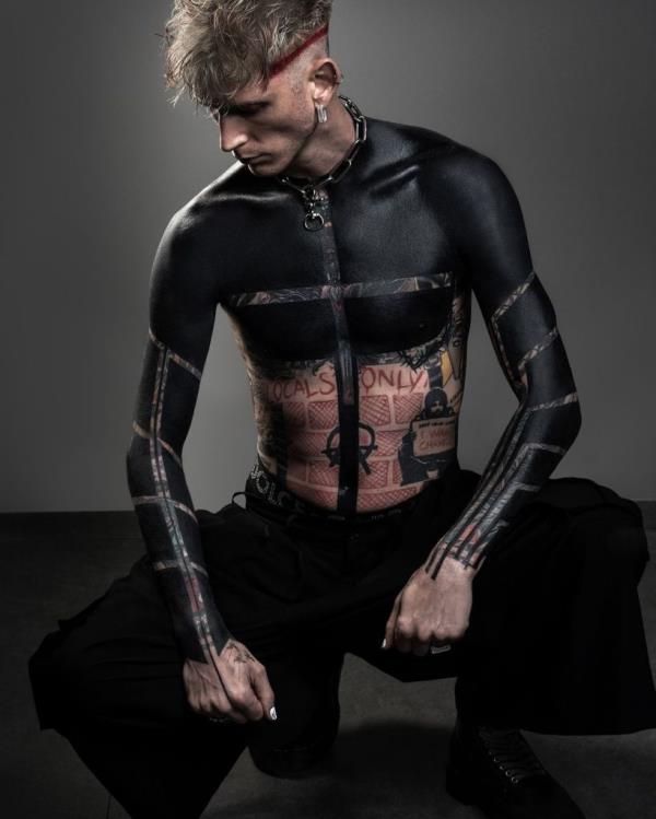 MGK shares video of getting viral blackout tattoo: 'Most painful s--t I ever experienced'