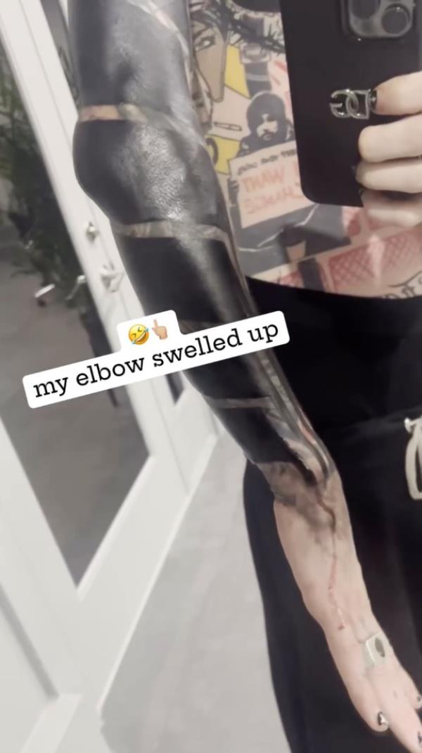 MGK shares video of getting viral blackout tattoo: 'Most painful s--t I ever experienced'