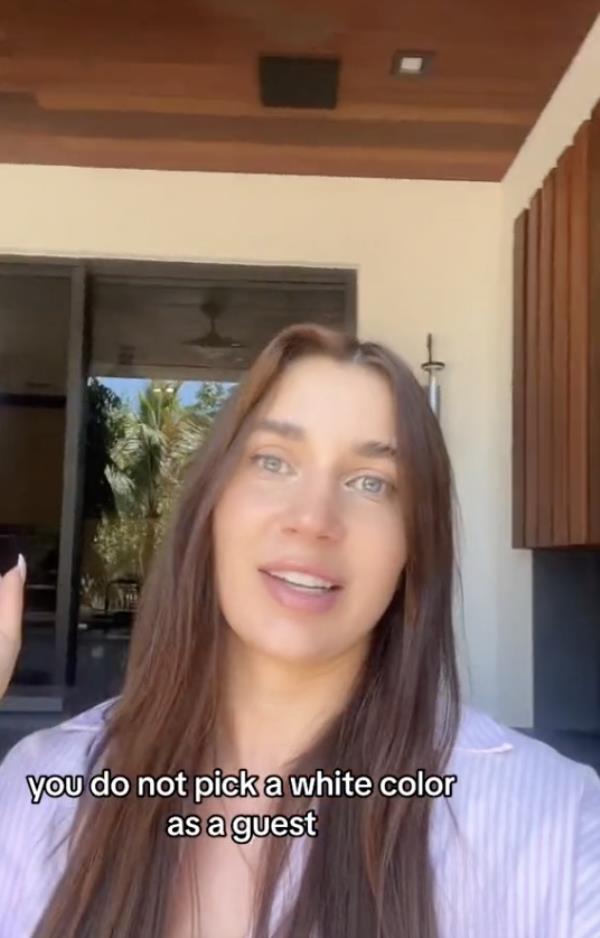 A screenshot of wedding guest Kristina Drobach, from Miami, explaining her TikTok-viral post a<em></em>bout the wedding guest who wore a white dress. 