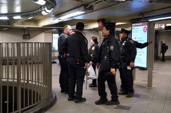 Police near the scene wher<em></em>e a person was assaulted with a glass bottle in the Columbus Circle subway station in New York, NY around 10:30 p.m. on March 27, 2024.