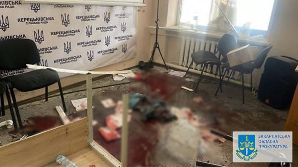 People seen huddling on the floor after grenade explosions 