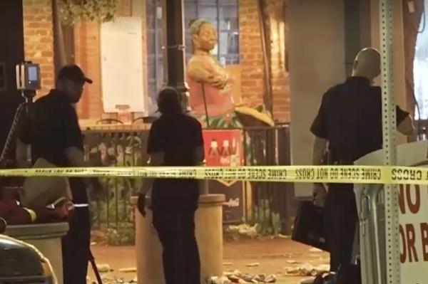 Officers shot and killed one of the gunmen after he downed the other.