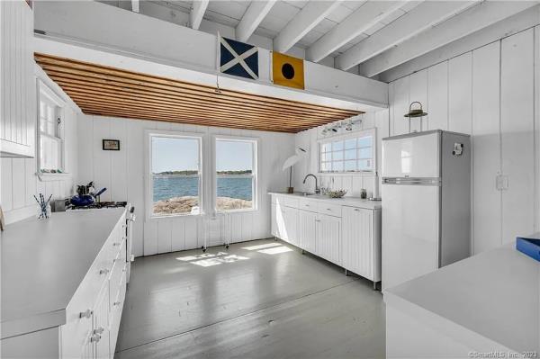 mouse island listing enters contract