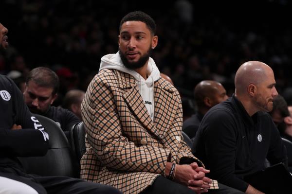 Ben Simmons #10 of the Brooklyn Nets looks on from the bench against the Miami Heat in the second half at Barclays Center on November 25, 2023 