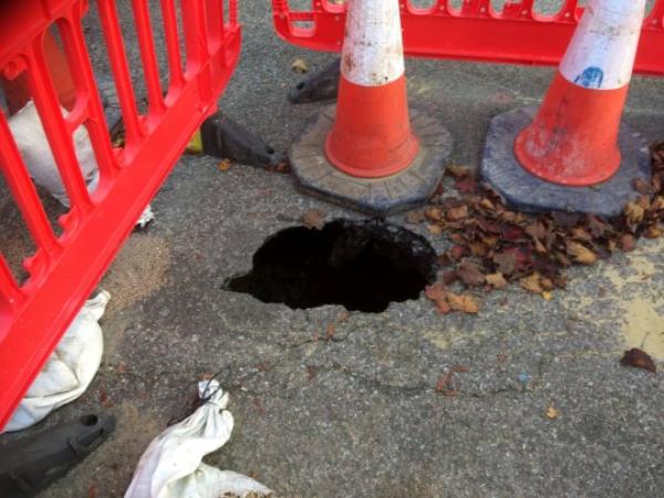 The appearance of several sink holes in a residential road in Gloucester this week has sparked renewed interest in the city?s long-held rumours and legends of ancient subterranean tunnels. Release date ? November 14, 2023. See SWNS story SWNAtunnels. The sink holes which appeared on Vicarage Road in the Tredworth area of Gloucester this last week, have caused residents worry and inconvenience, not o<em></em>nly as utility services to nearby houses have been affected and the road has been closed, but also as some locals have expressed co<em></em>ncerns that recent excessive rain and flooding may have disturbed some of the lost, forgotten and secret underground tunnels and passageways which have been long-rumoured to criss-cross and co<em></em>nnect numerous historic sites beneath the pavements and streets of the ancient city. Over the last couple of weeks the enviro<em></em>nment agency has issues several flood warnings for the area, and the heavy rain may be to blame. However, since the appearance of the sinkhole a local paranormal research group have been co<em></em>ntacted multiple times by co<em></em>ncerned townsfolk and intrigued locals. Edd Francis of Gloucester Paranormal Investigation Services said: ?We started getting messages on our Facebook page late last week, and then things kicked off over the weekend. Most of the enquiries were from local people asking if there could be a co<em></em>nnection between the sinkhole and the secret tunnels believed to be beneath the city.