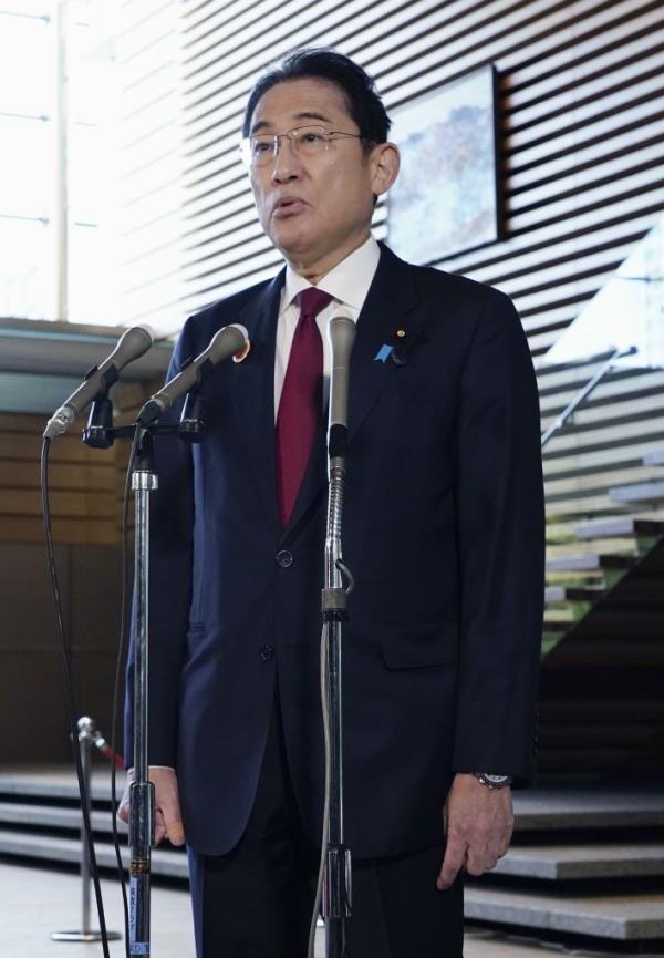 Japanese Prime Minister Fumio Kishida enters his office in Tokyo on Dec. 18, 2023, shortly after North Korea fired a ballistic missile toward the Sea of Japan. 