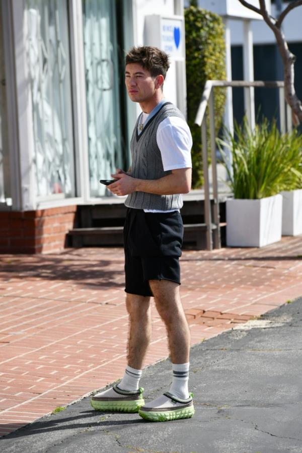 Barry Keoghan standing on a sidewalk on Melrose Avenue, Los Angeles during Oscar's weekend, March 09, 2024