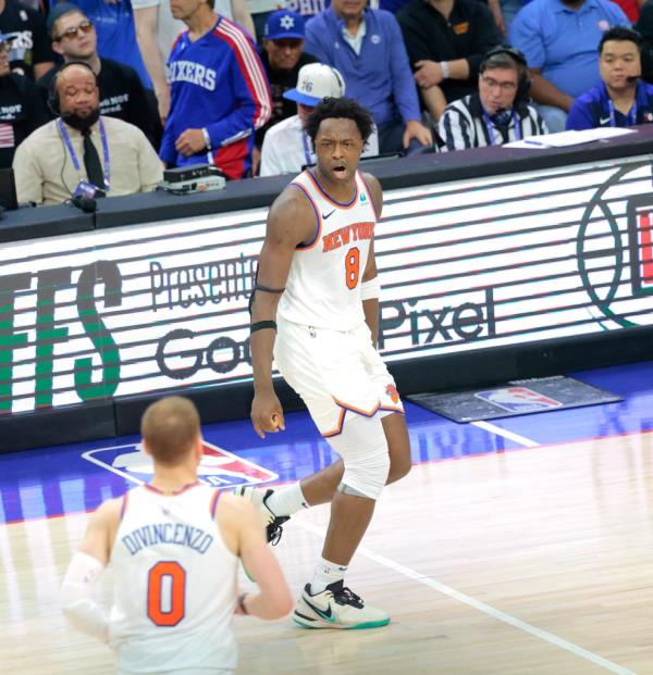 OG Anunoby #8 of the New York Knicks reacts after he hits a 3-point shot over Tobias Harris #12 of the Philadelphia 76ers during the third quarter.