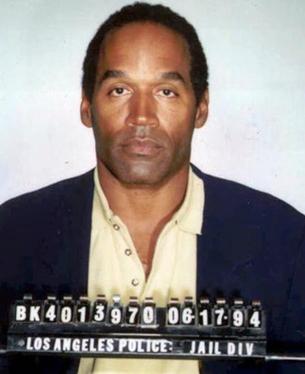 OJ's mugshot after his arrest for Nicole's murder in 1994.