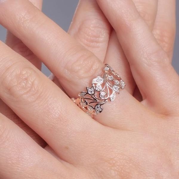 An image of a woman wearing the TJC Leafy Vines Ring