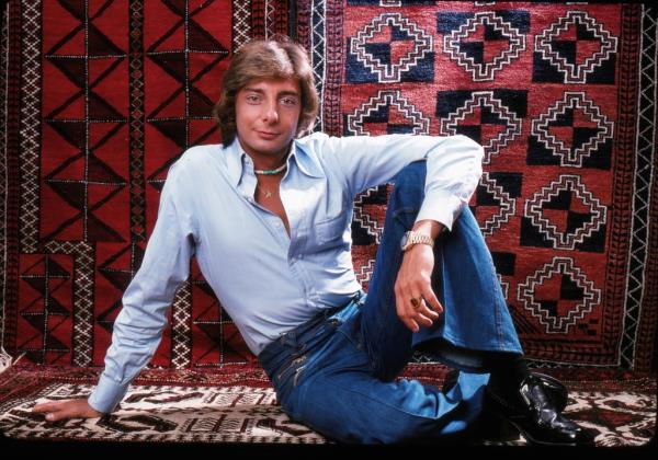 Barry Manilow in 1976 surrounded by patterned carpets.