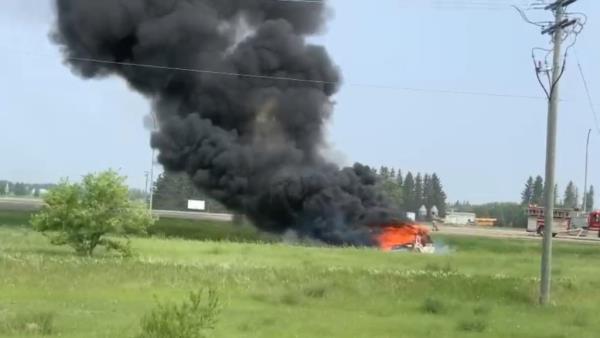 Bus on fire after crash in Manitoba