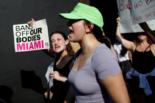 An abortion rights protester holds a sign as she demo<em></em>nstrates after the U.S. Supreme Court ruled in the Dobbs v Women's Health Organization abortion case, overturning the landmark Roe v Wade abortion decision in Miami, Florida, U.S. June 24, 2022.