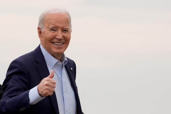 President Joe Biden gives a thumbs-up as he arrives to board Air Force One, Thursday, March 28, 2024, at Andrews Air Force ba<em></em>se, Md. Biden is headed to New York for a fundraiser.