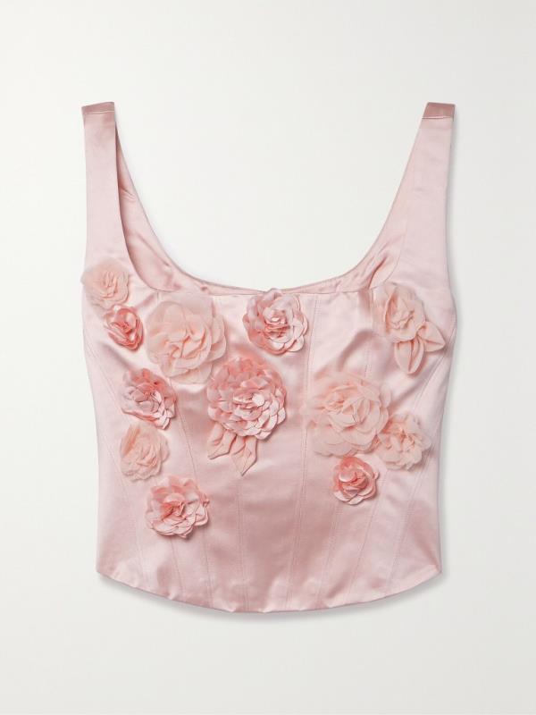 Pink satin bustier top with floral appliqué by LOVESHACKFANCY, styled as inspired by Bridgerton's Sharma Chic Corsette