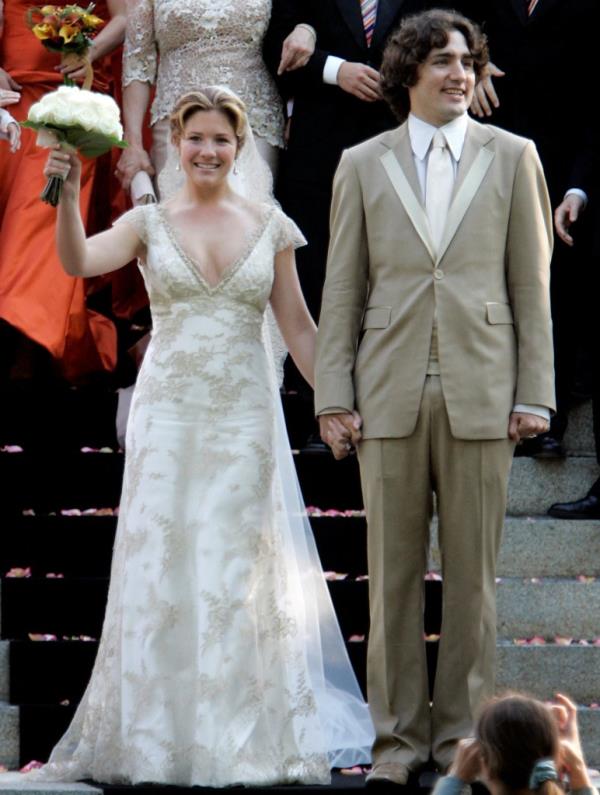 Justin Trudeau, son of the late Prime Minister Pierre Elliot Trudeau and his new bride Sophie Gregoire pose for photos following their wedding ceremony in Montreal, May 28, 2005.