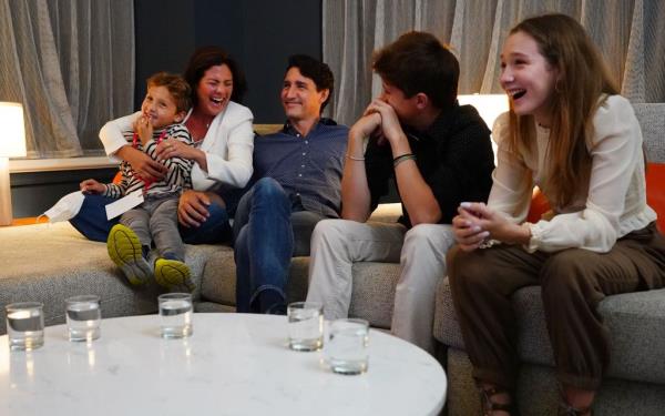 Canadian Prime Minister and Liberal leader Justin Trudeau (C) watches election results with wife Sophie Gregoire-Trudeau and children, Xavier, Ella-Grace and Hadrien, at Liberal headquarters in Montreal, September 20, 2021.