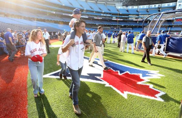 Justin Trudeau with his son Hadrien and wife Sophie leave the field  as the Toro<em></em>nto Blue Jays play the Baltimore Orioles  at the  Rogers Centre in Toronto. September 4, 2015.