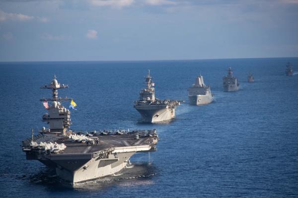 The strike group includes the aircraft carrier USS Gerald R. Ford, eight squadrons of attack and support aircraft, Tico<em></em>nderoga class guided missile cruiser USS Normandy, and missile destroyers USS Thomas Hudner, USS Ramage, USS Carney and USS Roosevelt.