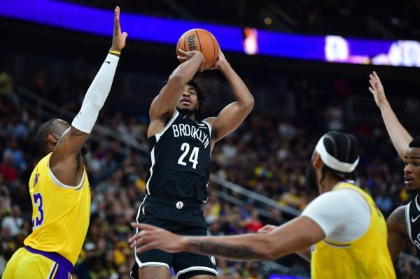 Nets guard Cam Thomas shoots against the Lakers on Oct. 9, 2023.