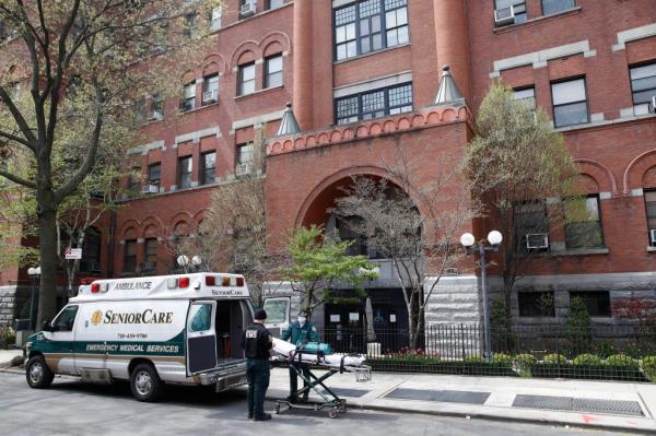 emergency medical workers arrive at Cobble Hill Health Center in the Brooklyn borough of New York