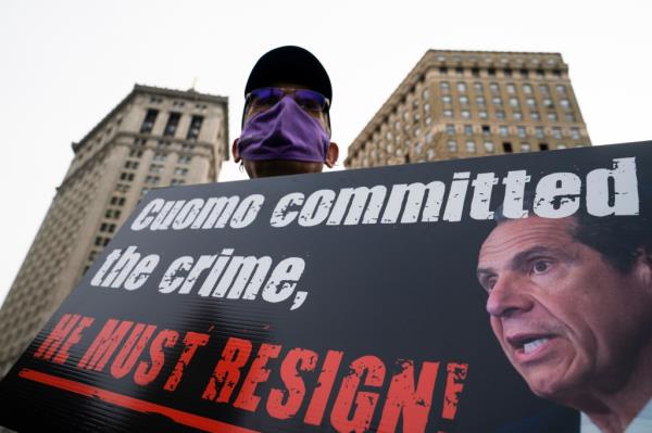 demo<em></em>nstrators gather for a rally decrying New York Gov. Andrew Cuomo