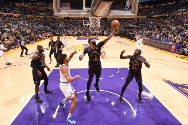 Anthony Davis #3 of the Los Angeles Lakers grabs the rebound against the Knicks.