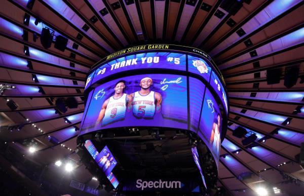 The New York Knicks ho<em></em>nor RJ Barrett #9 of the Toro<em></em>nto Raptors and Immanuel Quickley #5 of the Toro<em></em>nto Raptors for their time playing for the Knicks during the first half.