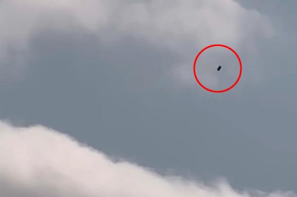 A UFO hangs in the sky in Bay Ridge, Brooklyn on July 30.