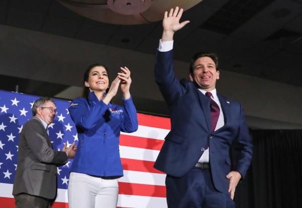 Florida Governor and Republican presidential candidate Ron DeSantis is joined by his wife Casey DeSantis at his Iowa caucus watch party in West Des Moines, Iowa, on Jan. 15, 2024.  