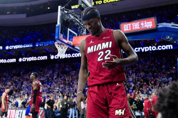 Miami Heat forward Jimmy Butler (22) reacts after a collision during the fourth quarter against the Philadelphia 76ers.
