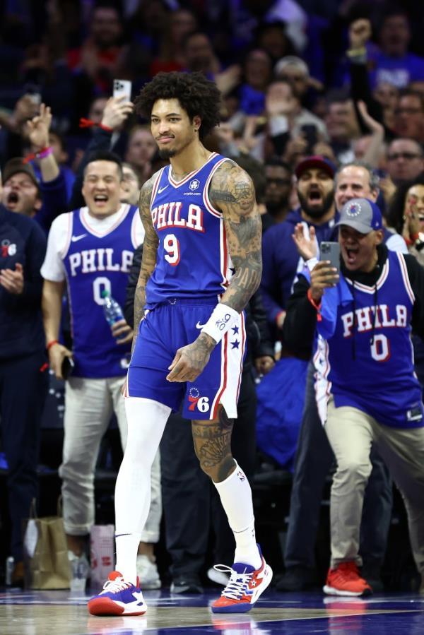 Kelly Oubre Jr. #9 of the Philadelphia 76ers reacts after scoring during the fourth quarter against the Miami Heat during the Eastern Co<em></em>nference Play-In Tournament at the Wells Fargo Center on April 17, 2024.