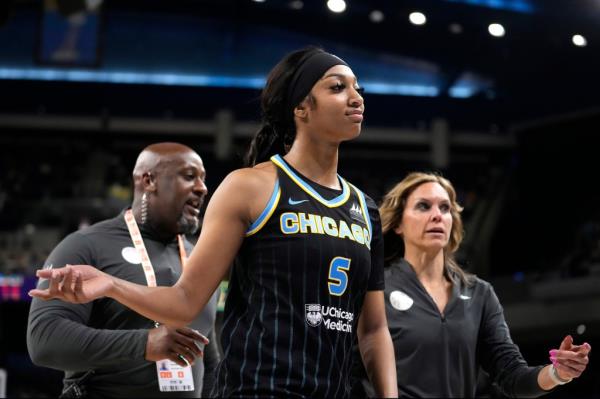 Chicago Sky's Angel Reese in her basketball uniform, heading to the locker room after being ejected from a WNBA game against New York Liberty.