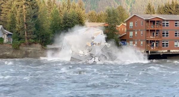 Grabs show a house before it collapses into a river due to glacial floods in Juneau, Alaska, U.S. 