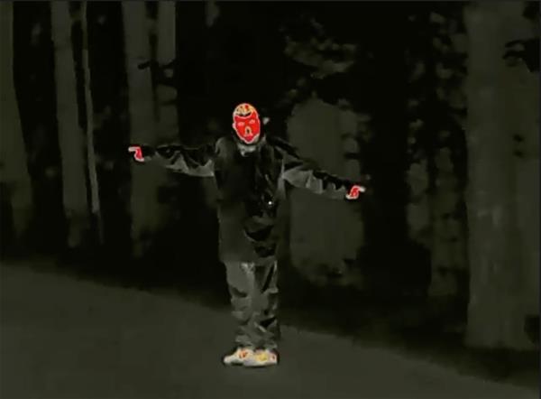 A man wears 'invisibility' suit.
