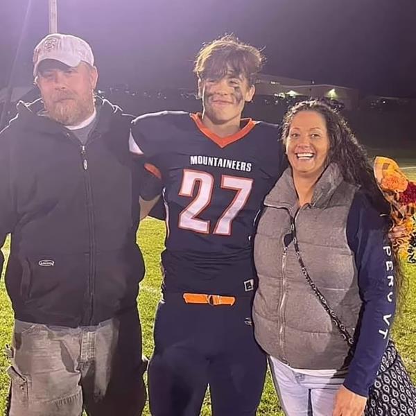 Craig Ross Jr. with one of his sons and former wife Lorena Kelsey Ross
