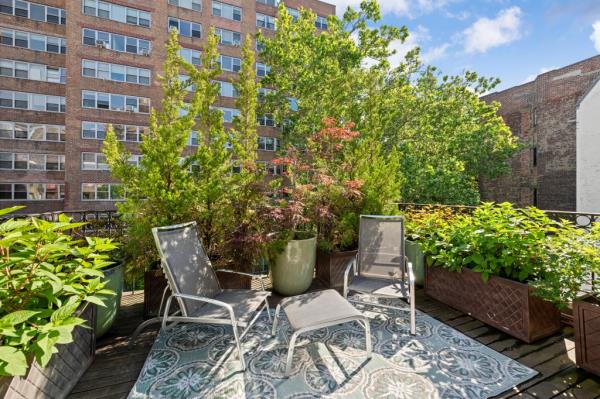 The townhouse comes with charming outdoor space. 