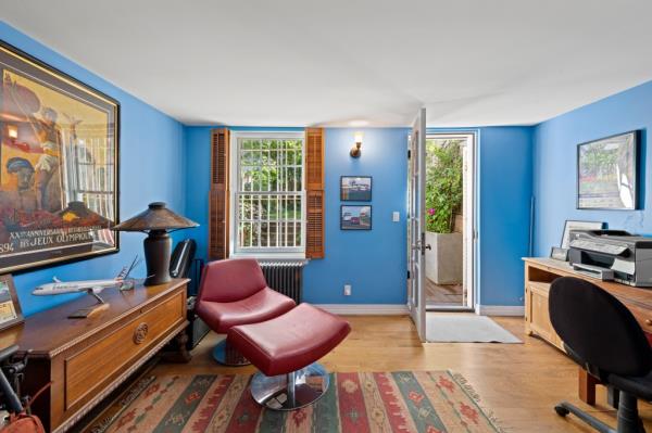 A colorful home office in the towhouse. 