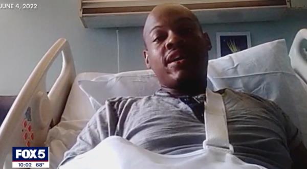 Tavon Silver speaks as he lays in a hospital bed with his arm in a sling. 