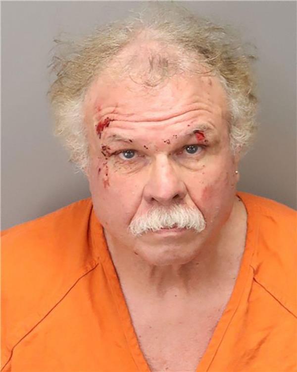 David Lee Henning has been charged with voyeurism and two counts of burglary.