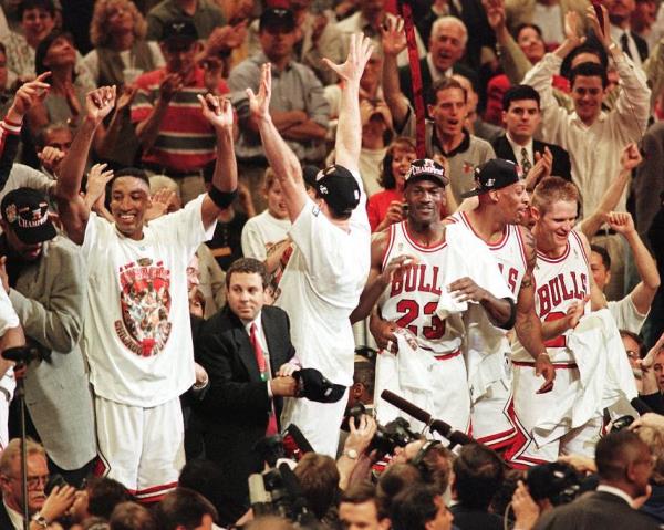 Mochael Jordan and Scottie Pippen after winning a championship.