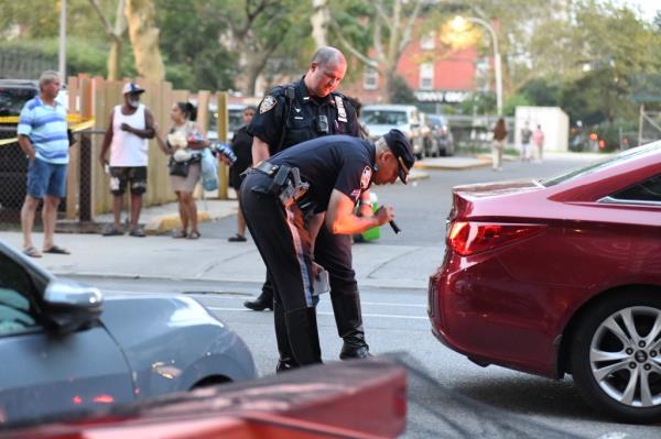 The driver was backing up into space, cops said. 