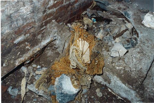 McGlone's body had been bound with chord and wrapped in a carpet before being entombed in cement in the late 60s