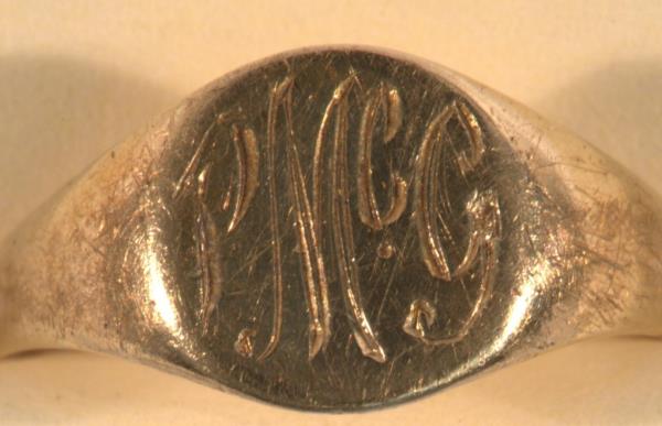 A signet ring bearing McGlone's initials was found encased in the cement alo<em></em>ngside her body