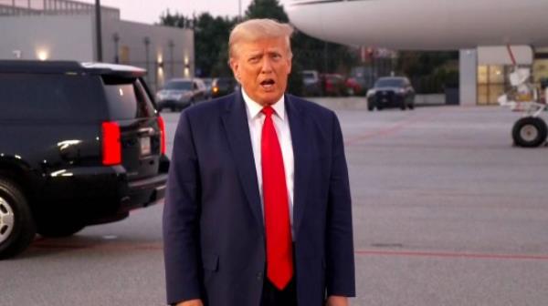 Ex-President Do<em></em>nald Trump addressed the media after he had his mugshot taken and before boarding his plane