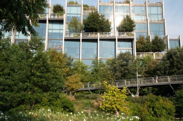 The building has leafy surroundings.