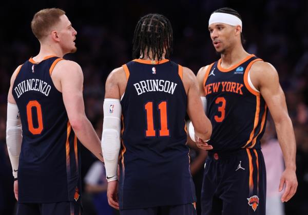 Do<em></em>nte DiVincenzo #0, Jalen Brunson #11 and Josh Hart #3 of the New York Knicks celebrate their win against the Indiana Pacers in Game Two of the Eastern Co<em></em>nference Second Round Playoffs at Madison Square Garden on May 08, 2024 in New York City. 