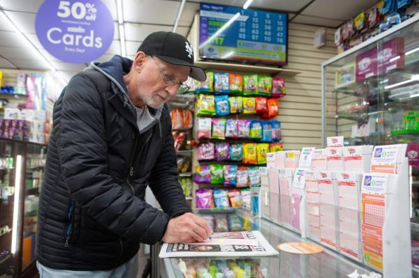 Arthur Stavola buys his Power Ball ticket at Bayside Smoke Shop on Bell Blvd in Bayside, NY, on April 3, 2024.