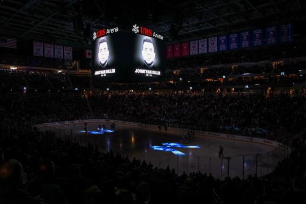 Detective Diller's photo on the jumbotron at SUB Arena.